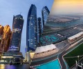 Abu Dhabi high rise buildings on the background of blue sky and Yas Water World on the background of amber sky