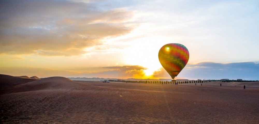 Hot Air Balloon Tourthrough amber sky