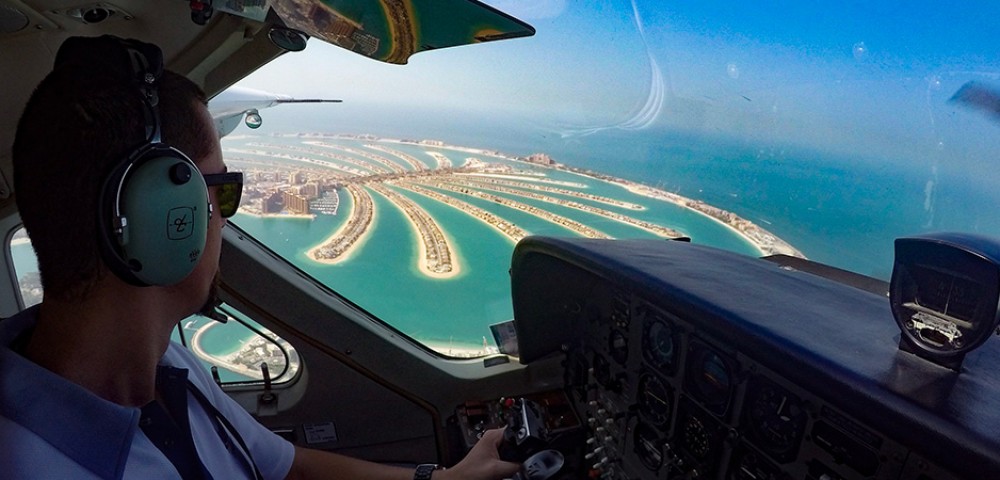 Sea Plane Tour Dubai over emerald water