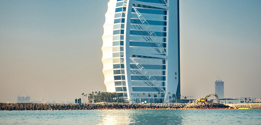 Luxury Tours Burj Al Arab Dubai in the blue sky background