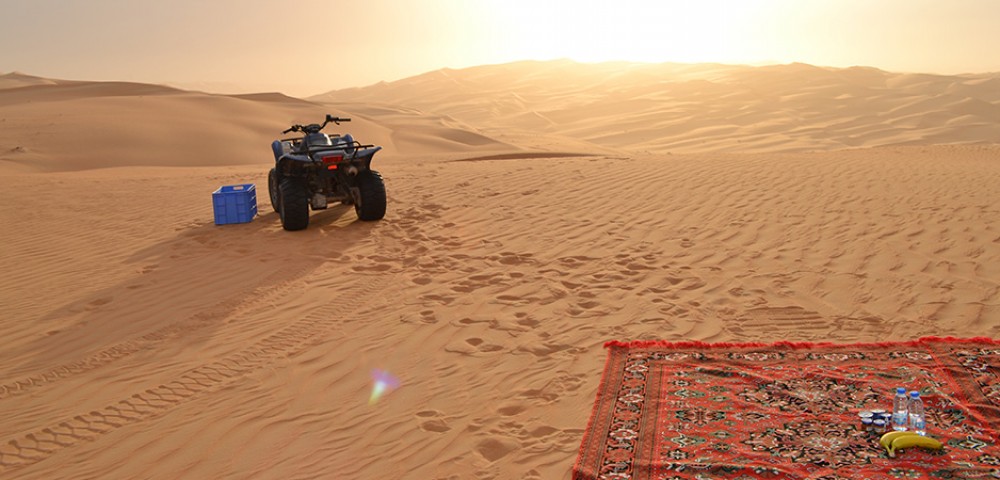 Liwa Desert Safari Tours black 4*4 vehicle dune bashing