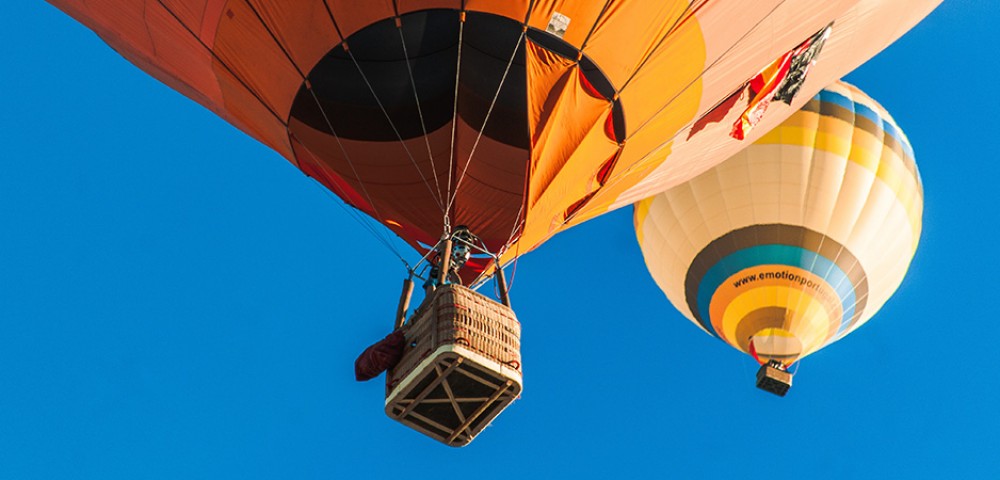 Hot Air Balloon Tourthrough amber sky