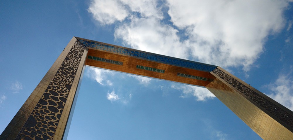 Dubai Sightseeing City Tour Combo Burj Khalifa with blue sky background and Dubai Frame