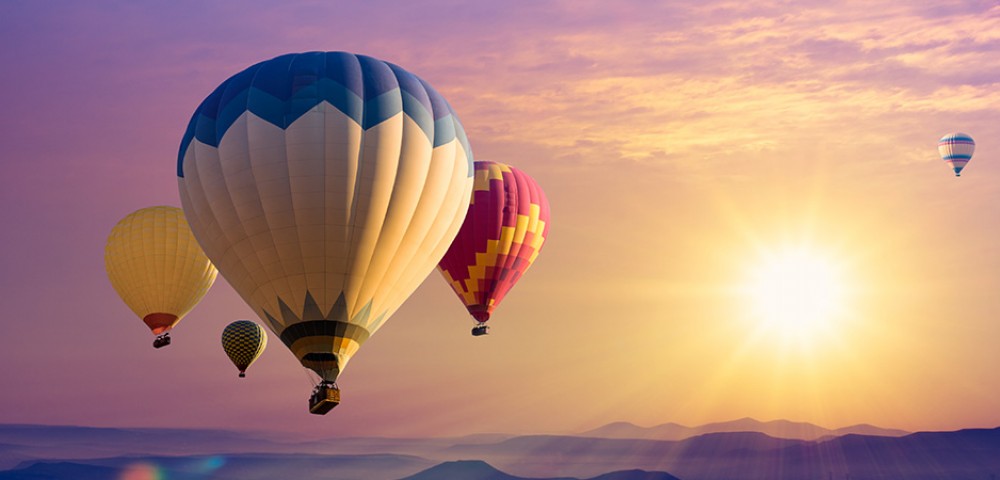 Hot Air Balloon Tourthrough amber sky