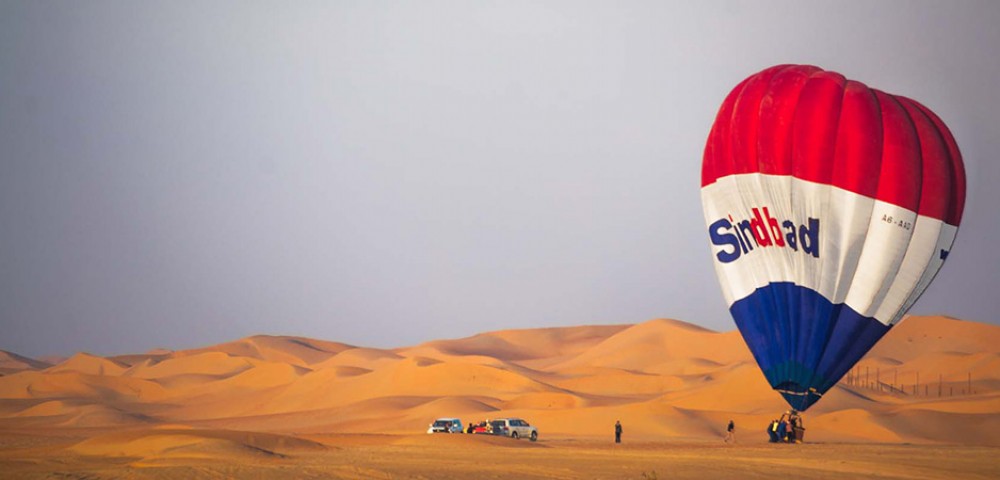 Hot Air Balloon Tourthrough amber sky