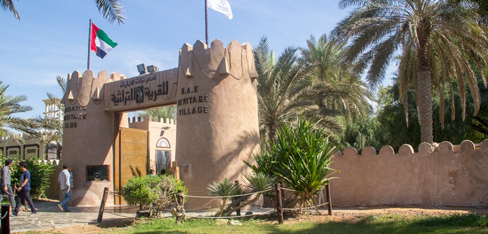 “A desert safari combo with a vehicle driving on the desert and Abu Dhabi City Tour combo  with tall buildings in the background”