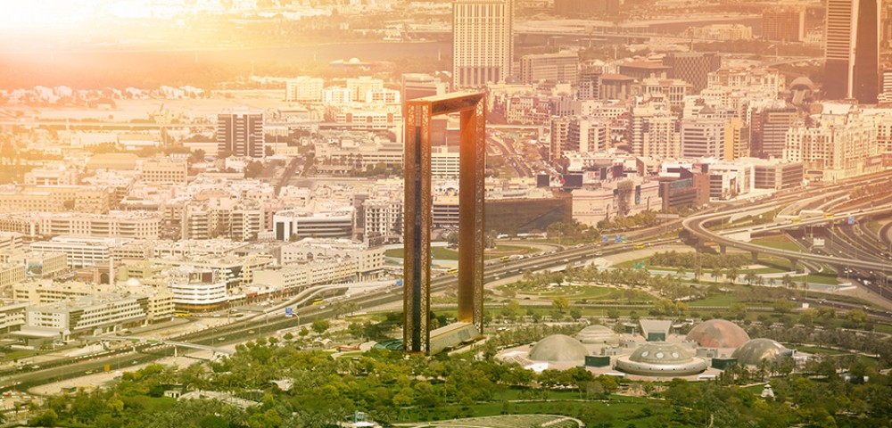 Dubai Sightseeing City Tour Combo Burj Khalifa with blue sky background and Dubai Frame