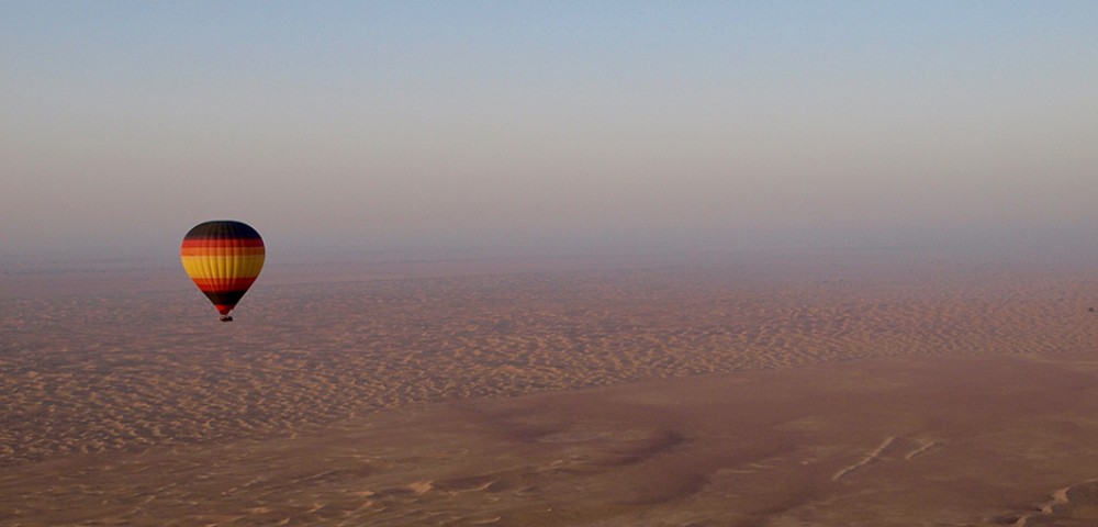 Hot Air Balloon Tourthrough amber sky