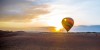 Hot Air Balloon Tourthrough amber sky