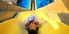 Yas water world Abu Dhabi kids on water slide