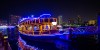 Dubai Sightseeing City Tour Combo, white 4*4 vehicle in the dunes Desert Safari and Dhow Cruise Combo dhow in the night