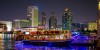 Dubai Sightseeing City Tour Combo, white 4*4 vehicle in the dunes Desert Safari and Dhow Cruise Combo dhow in the night