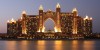 Luxury Tours Atlantis in the background of sky and palm trees