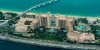 Luxury Tours Atlantis in the background of sky and palm trees