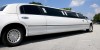 Full Day Limousine Tour in a silver luxury vehicle