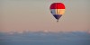 Hot Air Balloon Tourthrough amber sky