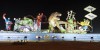 Dubai Sightseeing City Tour Combo Dubai Frame at day light and IMG Worlds of Adventure roaring dinosaur at night