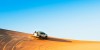 “A desert safari combo with a vehicle driving on the desert and Abu Dhabi City Tour combo  with tall buildings in the background”