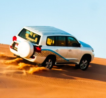 Abu Dhabi Desert Safari Tours dune bashing at sunrise